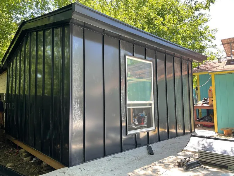 Black standing seam metal wall panels for Roof Inspection in Wedgefield