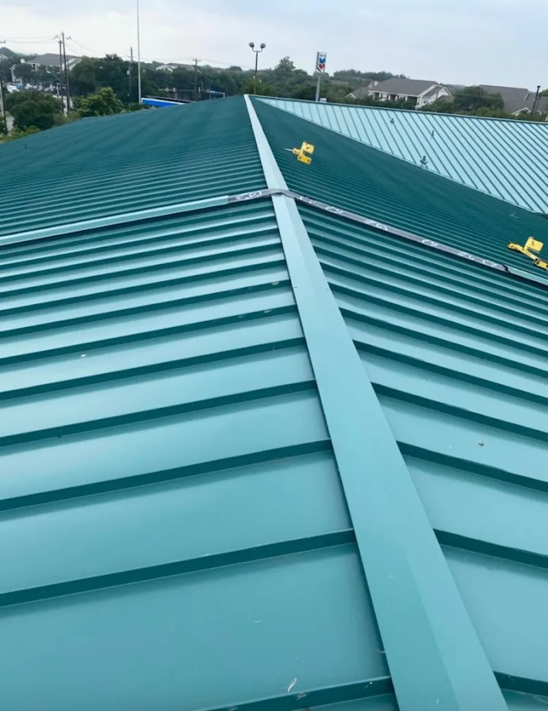 Green commercial metal roof ridge and valley for Metal Roof Repair in Wedgefield
