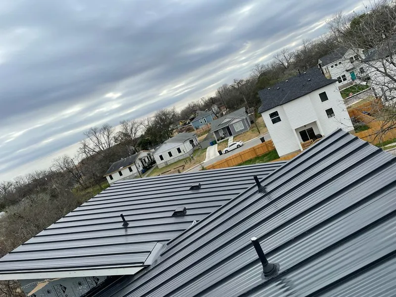 Standing seam metal roof panels with vents for Skylight Repair in Wedgefield